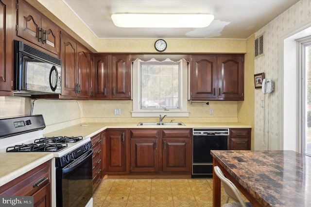 kitchen featuring black appliances and sink