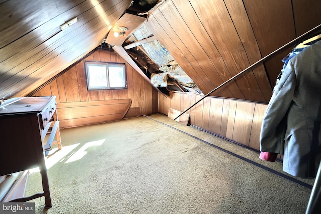 bonus room with lofted ceiling, light carpet, wood ceiling, and wood walls