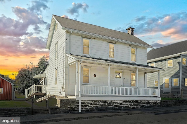 front of property with a porch