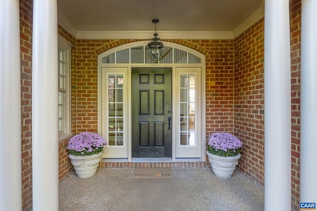 entrance to property featuring a porch