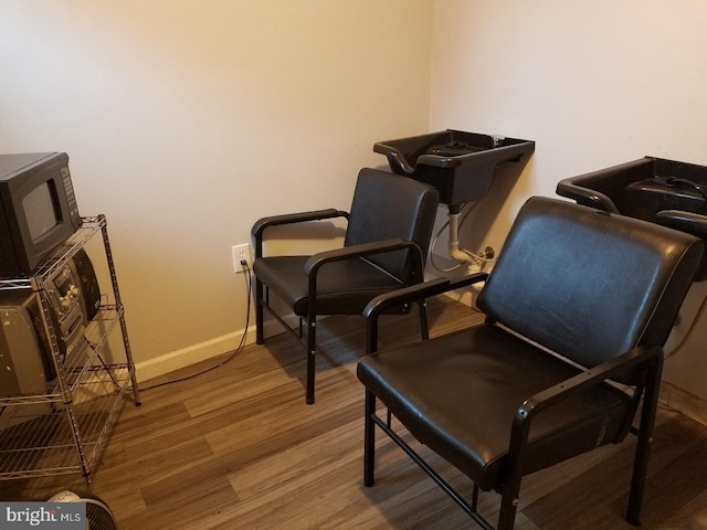 sitting room featuring hardwood / wood-style floors