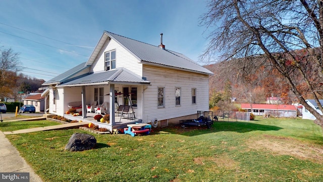 exterior space with a front lawn