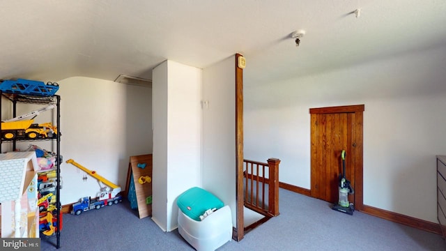 game room with light colored carpet