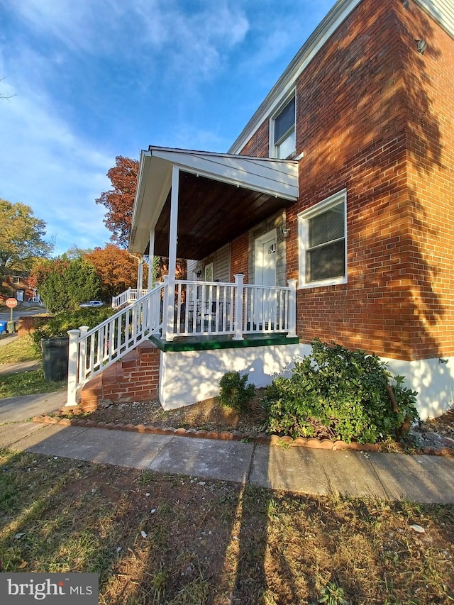 exterior space featuring covered porch