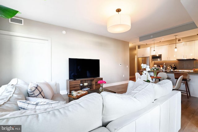 living room featuring hardwood / wood-style floors