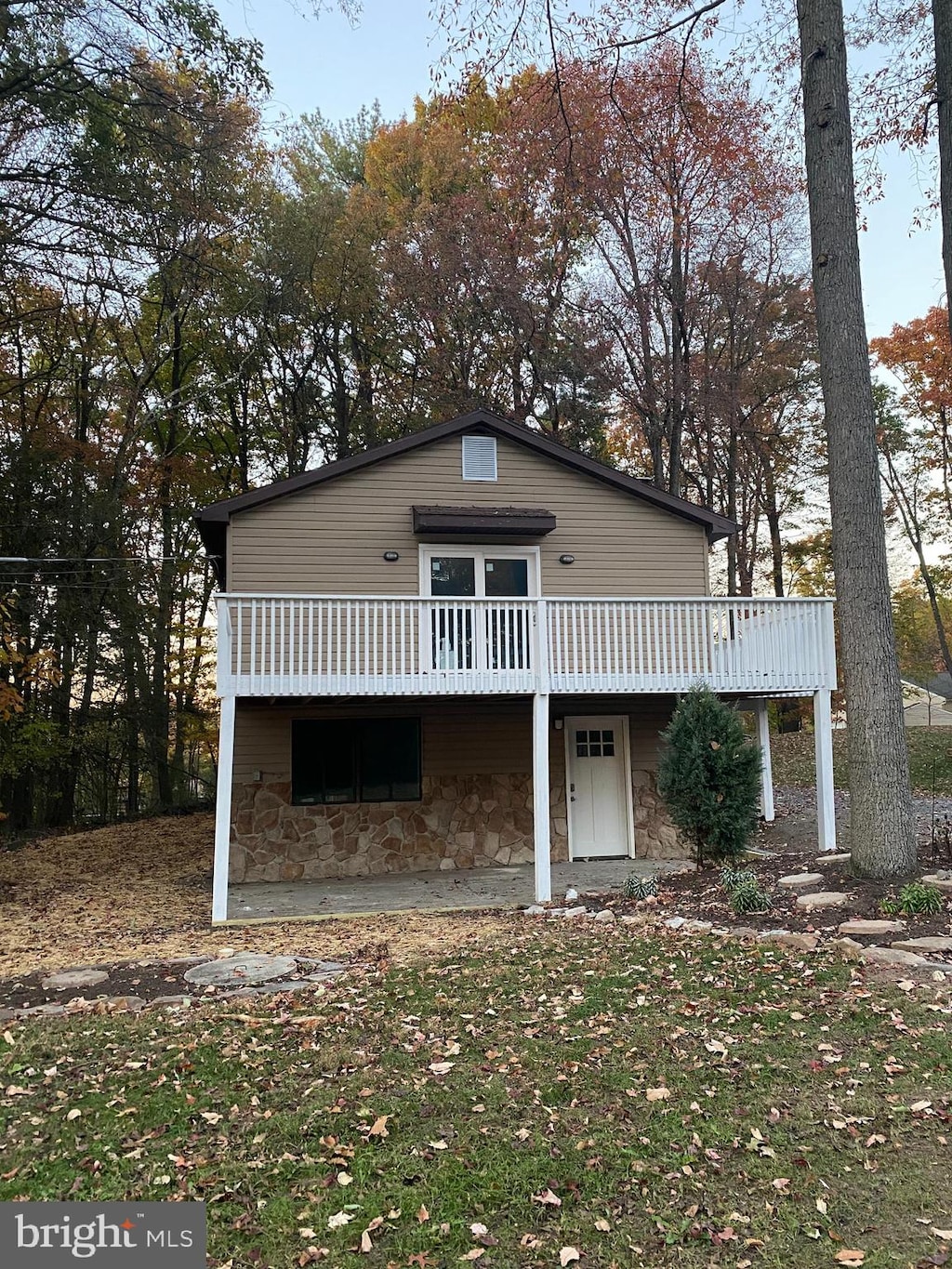 view of front of house with a deck