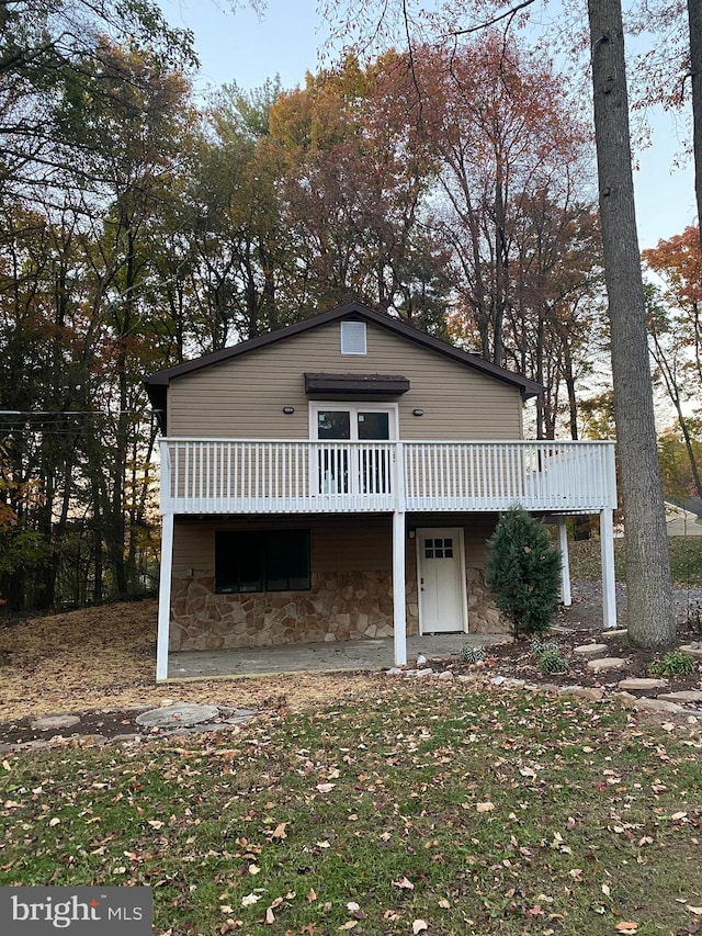 view of front of house with a deck