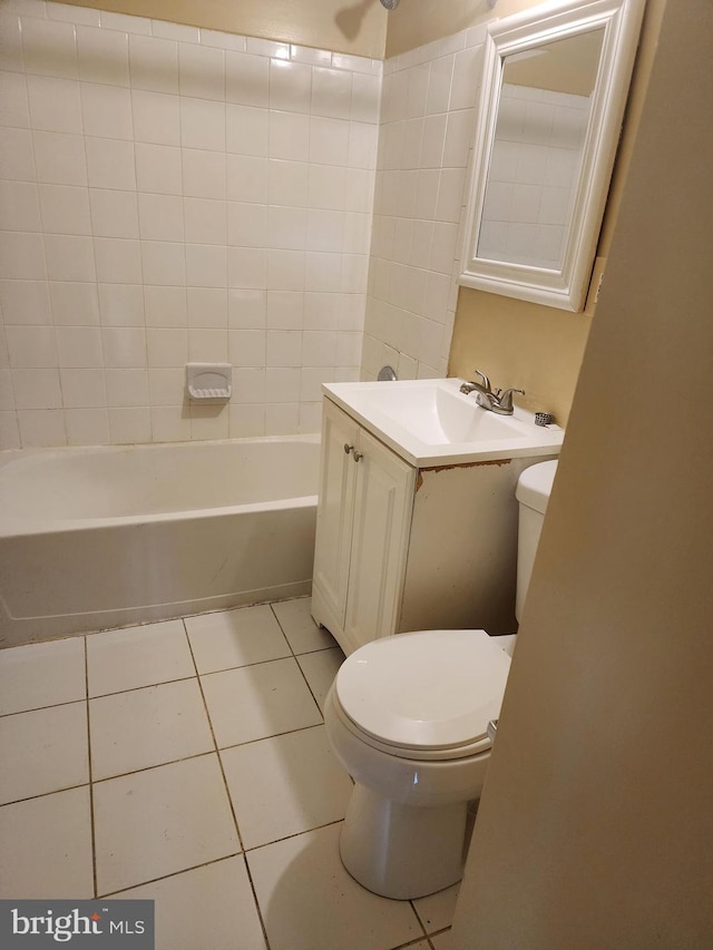 full bathroom with vanity, toilet, tile patterned flooring, and tub / shower combination