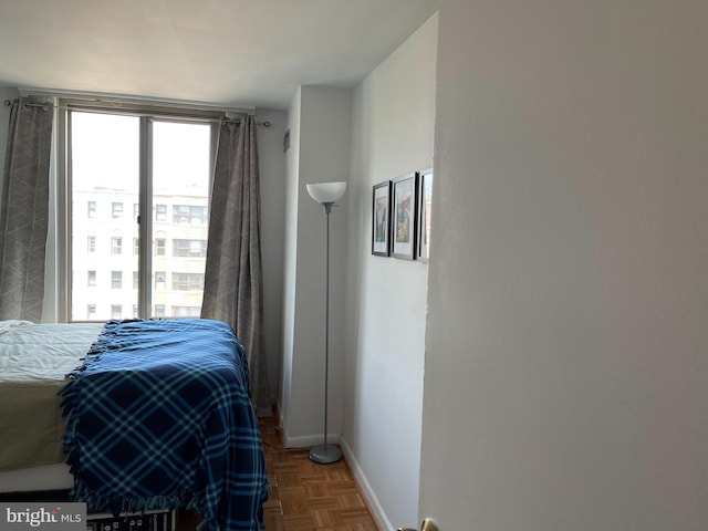 bedroom with parquet floors