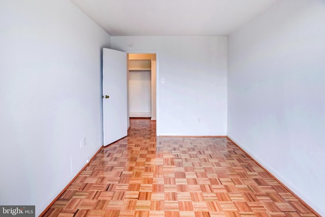 empty room featuring light parquet flooring