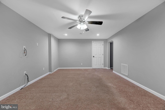 unfurnished room featuring carpet floors and ceiling fan