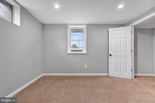 unfurnished room with carpet flooring