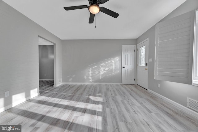 interior space with ceiling fan and light hardwood / wood-style floors