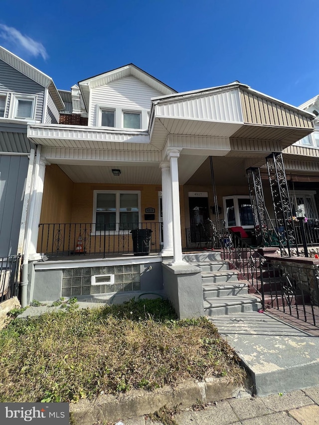 view of front of property featuring covered porch