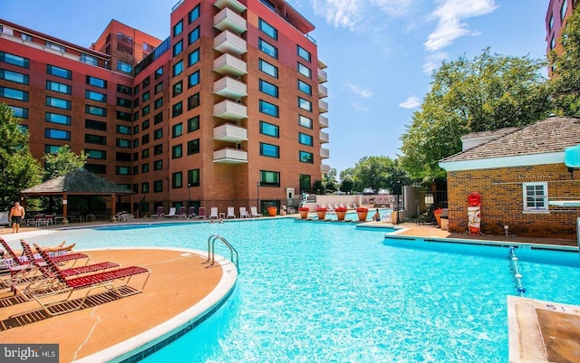 community pool featuring a gazebo