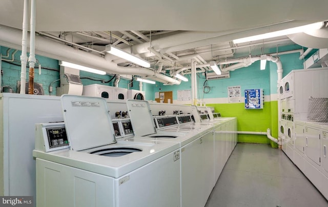 common laundry area featuring stacked washer and dryer, separate washer and dryer, and concrete block wall
