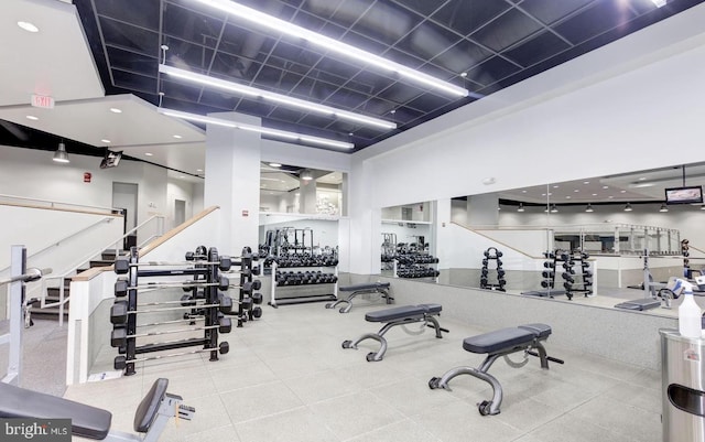 gym featuring a high ceiling