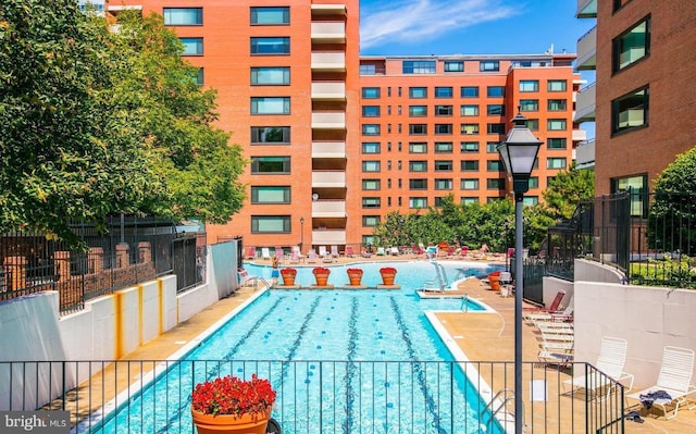 community pool with fence