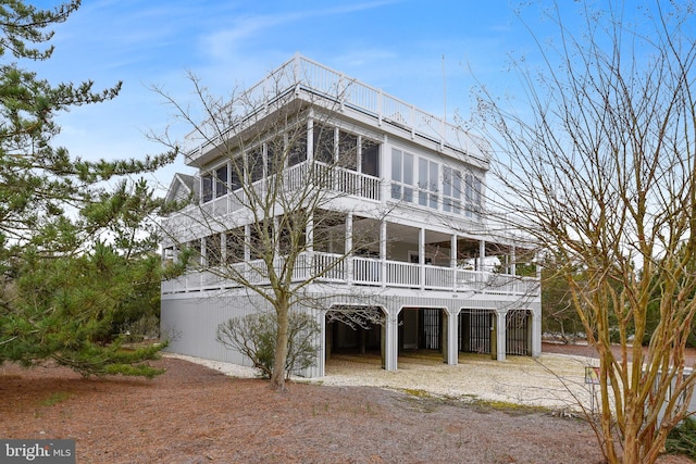 view of front of house with a sunroom