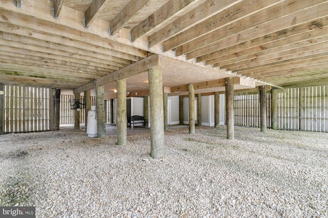 misc room with wood ceiling and carpet flooring