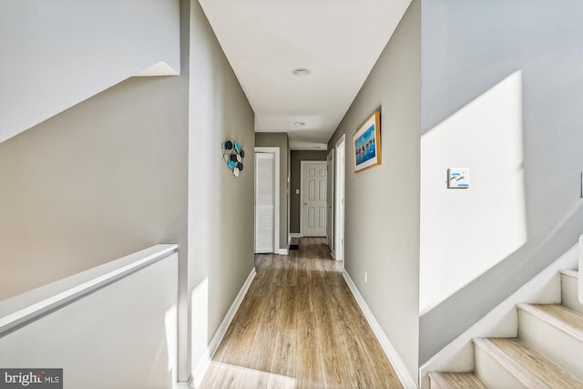 hallway featuring light wood-type flooring