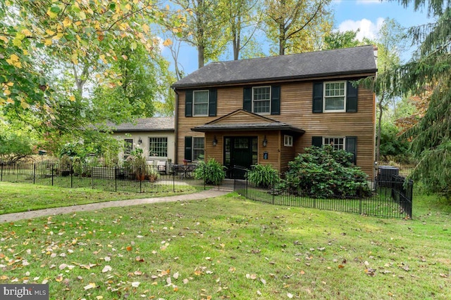 view of front of home with a front lawn