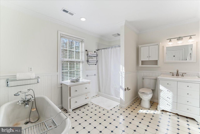 bathroom featuring toilet, a tub to relax in, vanity, and ornamental molding