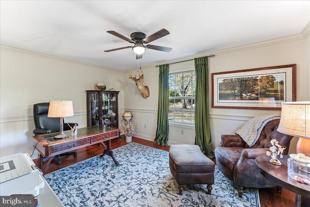 home office with ornamental molding, wood-type flooring, and ceiling fan