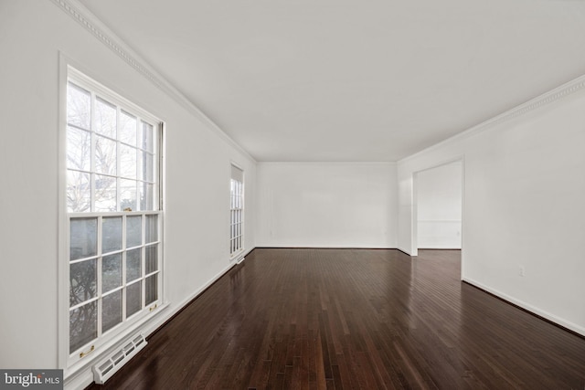 unfurnished room with dark hardwood / wood-style floors and ornamental molding