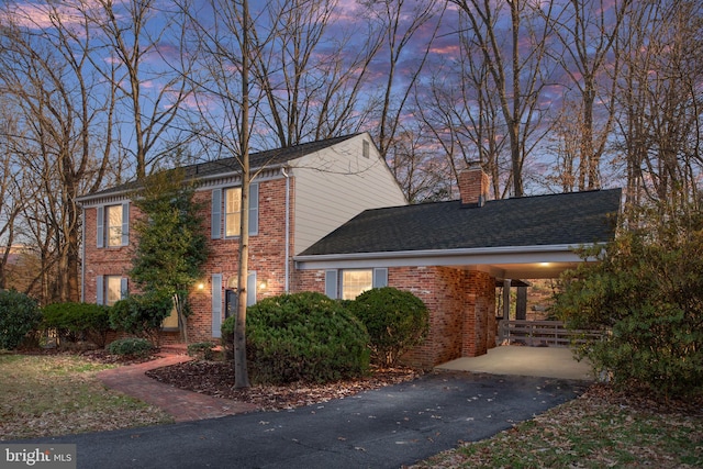 view of front of property with a carport