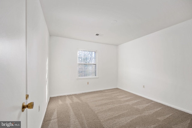 unfurnished room featuring carpet flooring