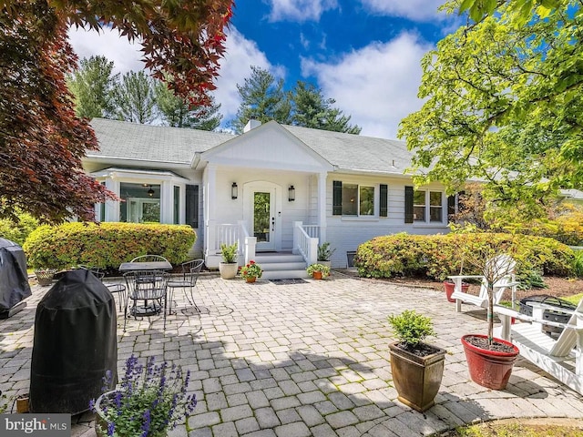 view of front of property featuring a patio area