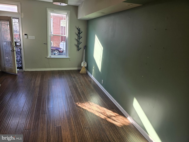 entrance foyer with dark hardwood / wood-style flooring