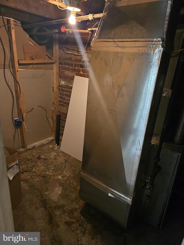 basement featuring heating unit