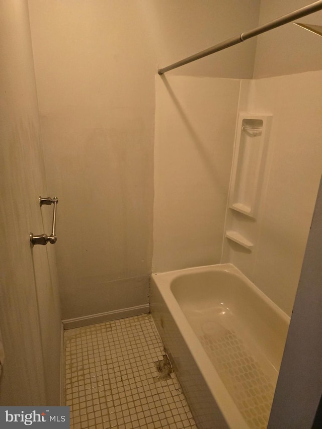 123 N Belnord Ave, Baltimore, MD 21224 - full bathroom with tile patterned flooring, baseboards, and shower / tub combination