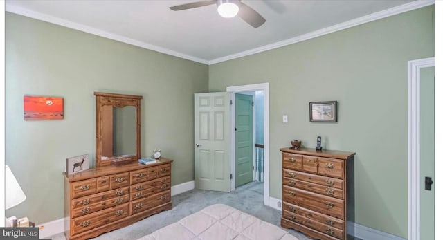 bedroom with ornamental molding, light carpet, and ceiling fan