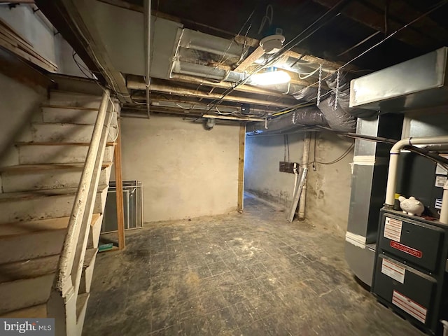 basement featuring heating unit