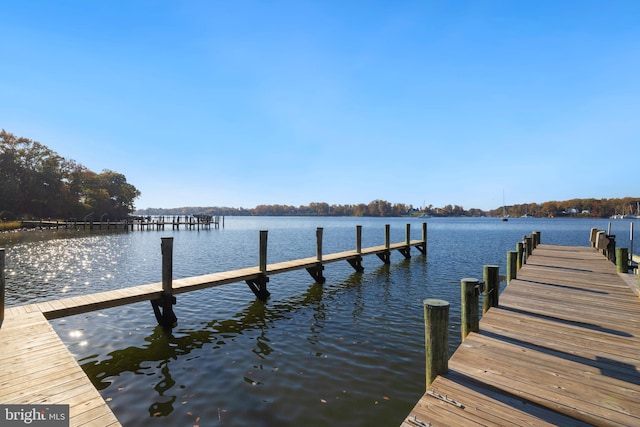 view of dock with a water view