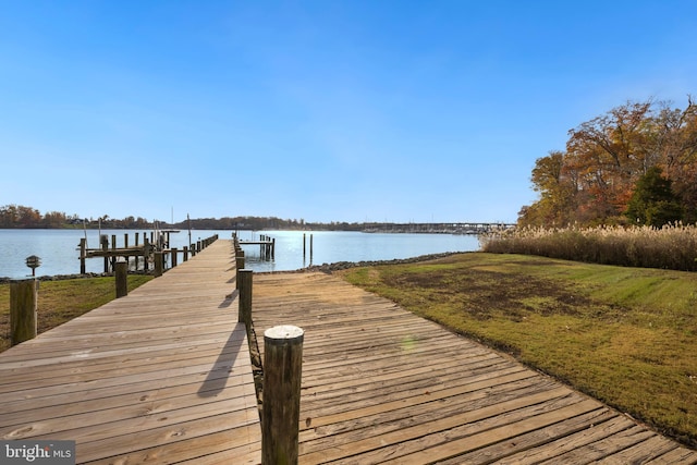 view of dock with a water view