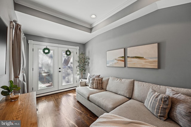 living room featuring french doors, vaulted ceiling, crown molding, and dark hardwood / wood-style flooring