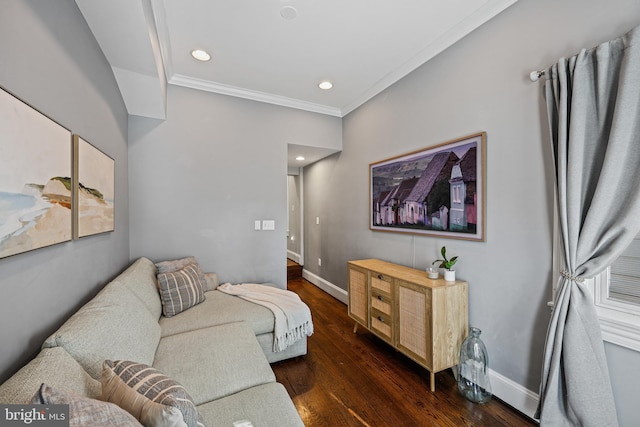 living room with dark wood-type flooring and crown molding