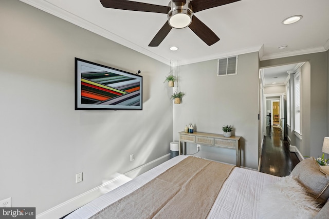 bedroom with ornamental molding, ceiling fan, and dark hardwood / wood-style flooring