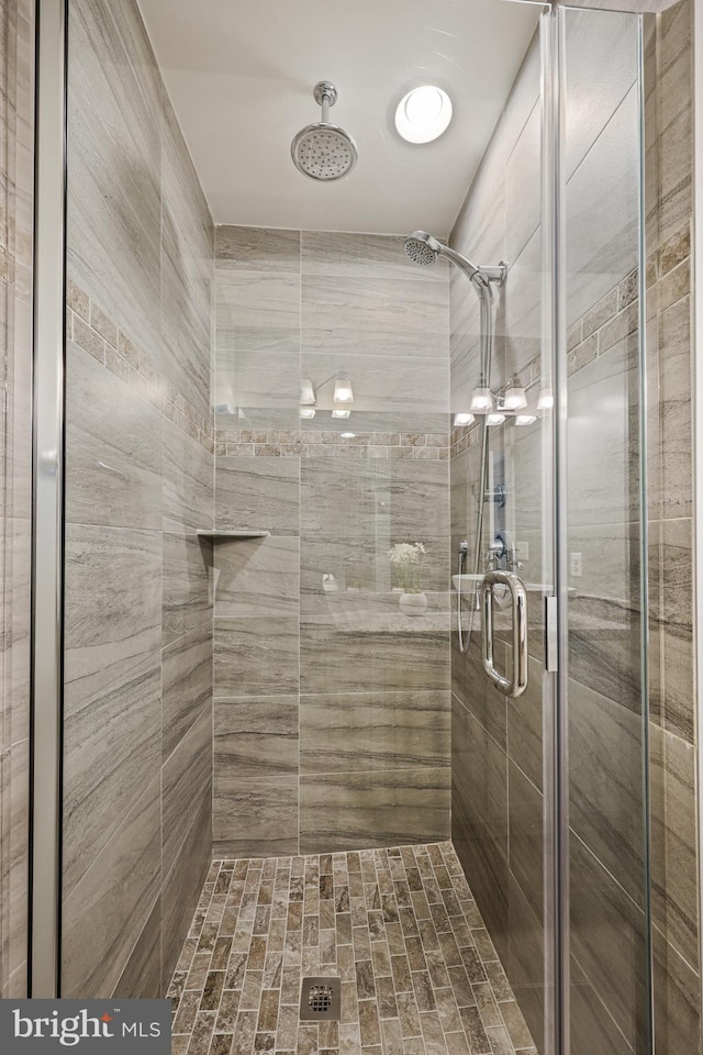 bathroom featuring walk in shower