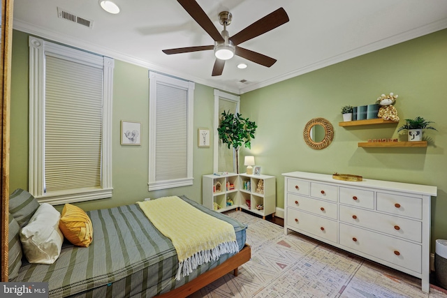 bedroom with crown molding and ceiling fan