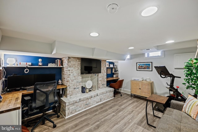 home office with hardwood / wood-style floors