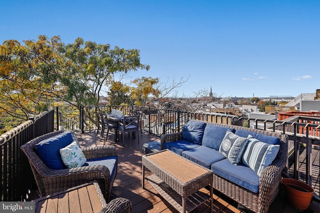 deck with an outdoor hangout area