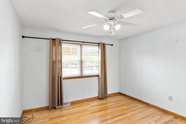 unfurnished room with light hardwood / wood-style floors and ceiling fan