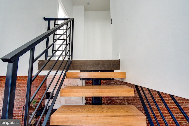 stairs with brick wall