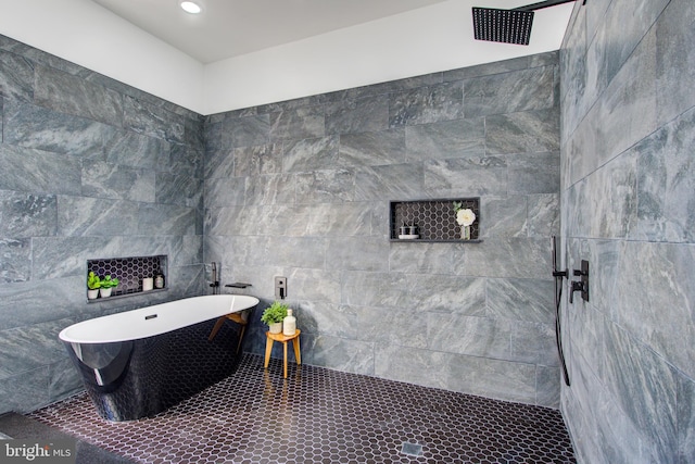 bathroom with plus walk in shower and tile walls