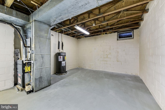 basement with electric water heater and heating unit